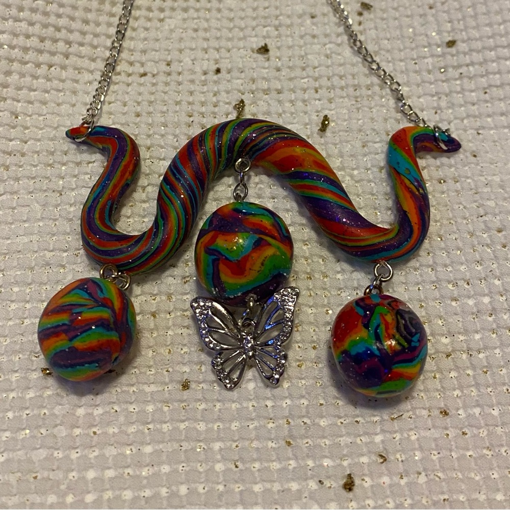 Red and Blue Swirl Necklace with Butterfly Charm